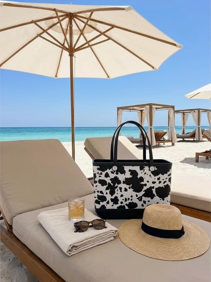SALT by lumena Cow Print EVA tote at a beach club