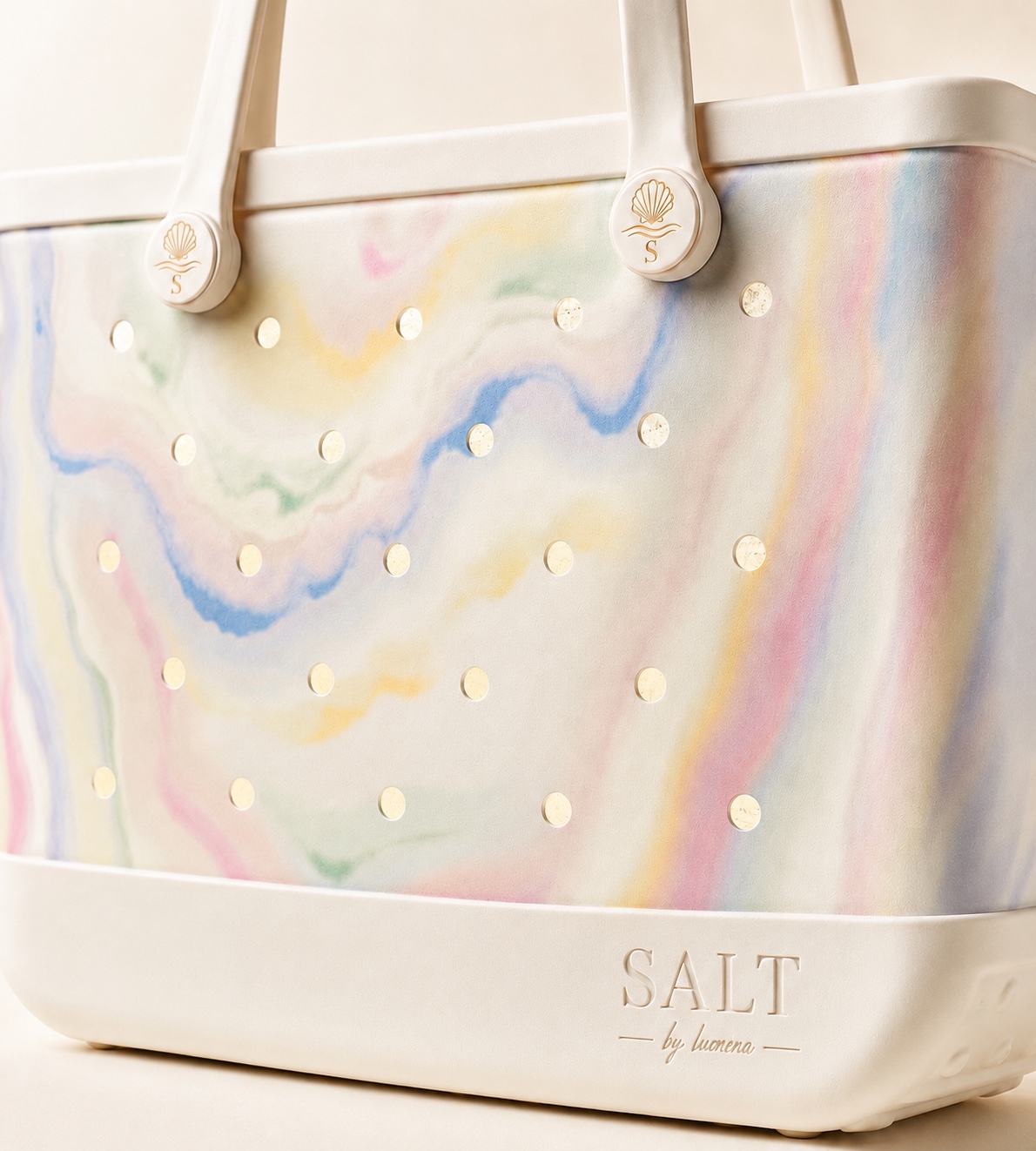 Close-up of textured EVA, shell buttons and engraved SALT logo